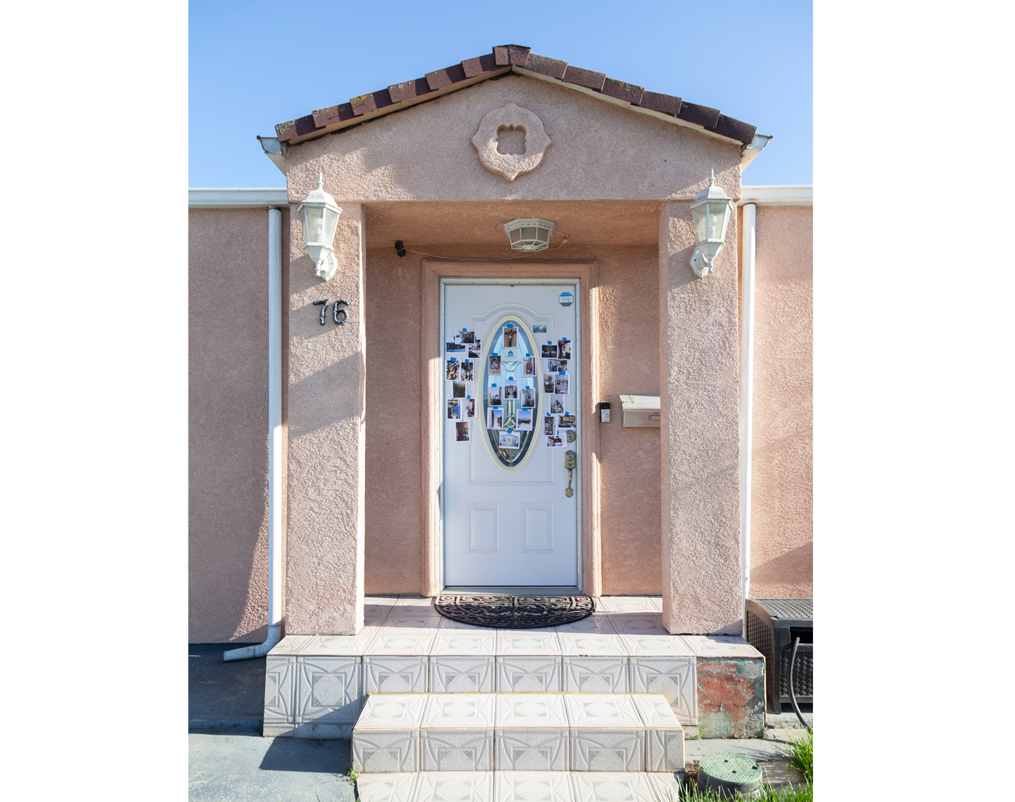 Photograph of my front door with photographs of the inside