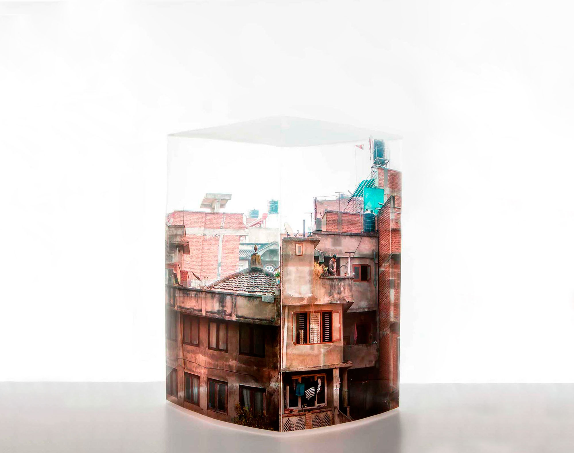 Photographic transparent sheet of Kathmandu City, Nepal, fused together to create a three-dimensional box.